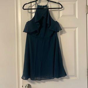 Hunter green halter ruffle dress.